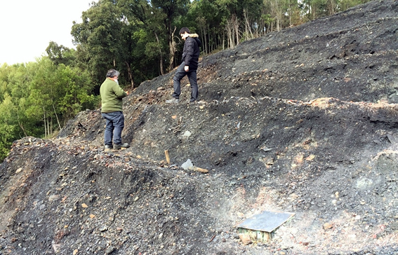 The coal truth: Two of the researchers fitting sensors in a spoil heap in Portugal.