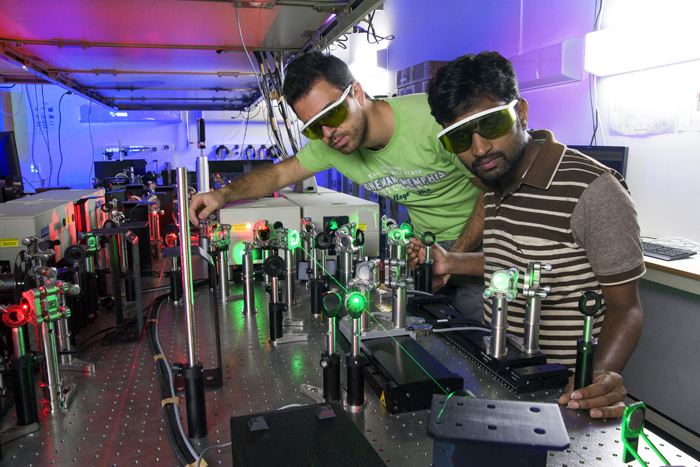 Researchers Margiolakis and Mariserla generating terahertz radiation.
