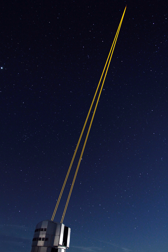 Four lasers project beams into the sky above Chile’s Atacama desert.