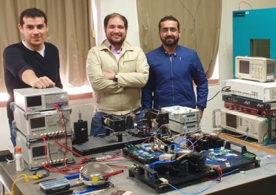 UC2M team with optical setup for direct hyperspectral dual-comb imaging.