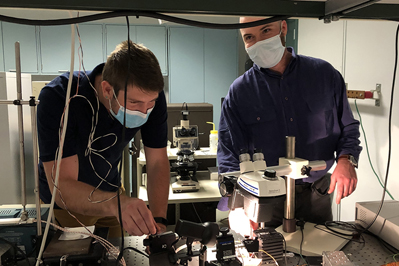 Alex Newell (l.) and Kevin Reilly characterizing a semiconductor diode laser. 