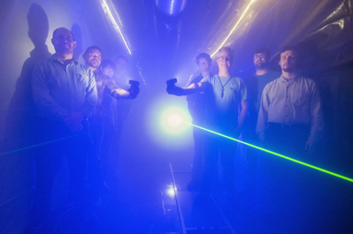 Foggy notions: Members of Sandia’s fog chamber research team inside the facility.