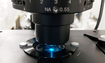 Coating converts conventional microscope into super-resolution scope.