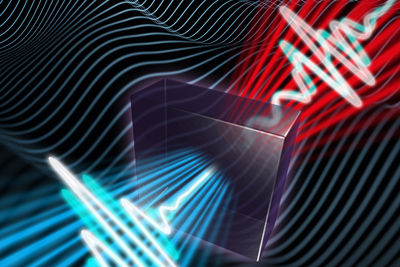 Ultrashort laser pulses go through a nonlinear crystal and undergo frequency-mixing.