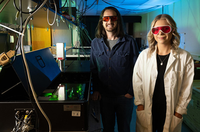 CSU researchers Yusef Farah and Rachelle Austin with the spectrometer they used.