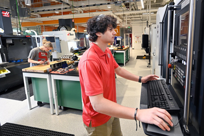 Students work in the Center for Additive Manufacturing and Logistics. 