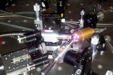 A high-powered SDL (semiconductor disk laser) using two fiber-coupled pump sources