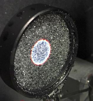 Granular surface: a mirror formed from glitter
